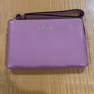 COACH Pink Pebbled Leather Wristlet with Gold Logo